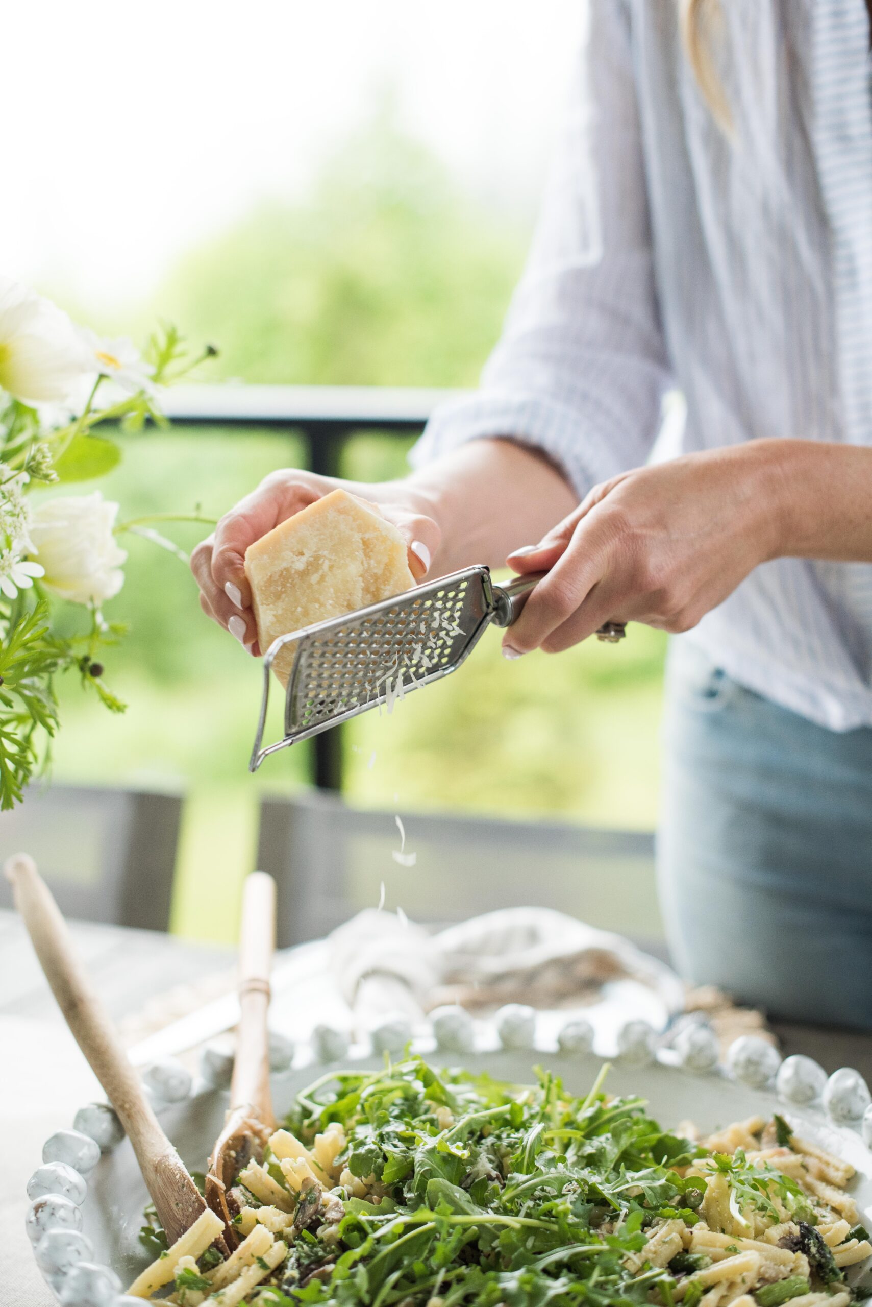 Karlene Karst Mushroom Arugula Pasta grating fresh parmesan